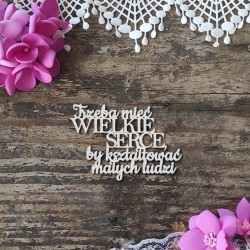 Napis "Trzeba mieć wielkie serce, by..."
