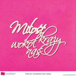 Miłość krąży… – napis